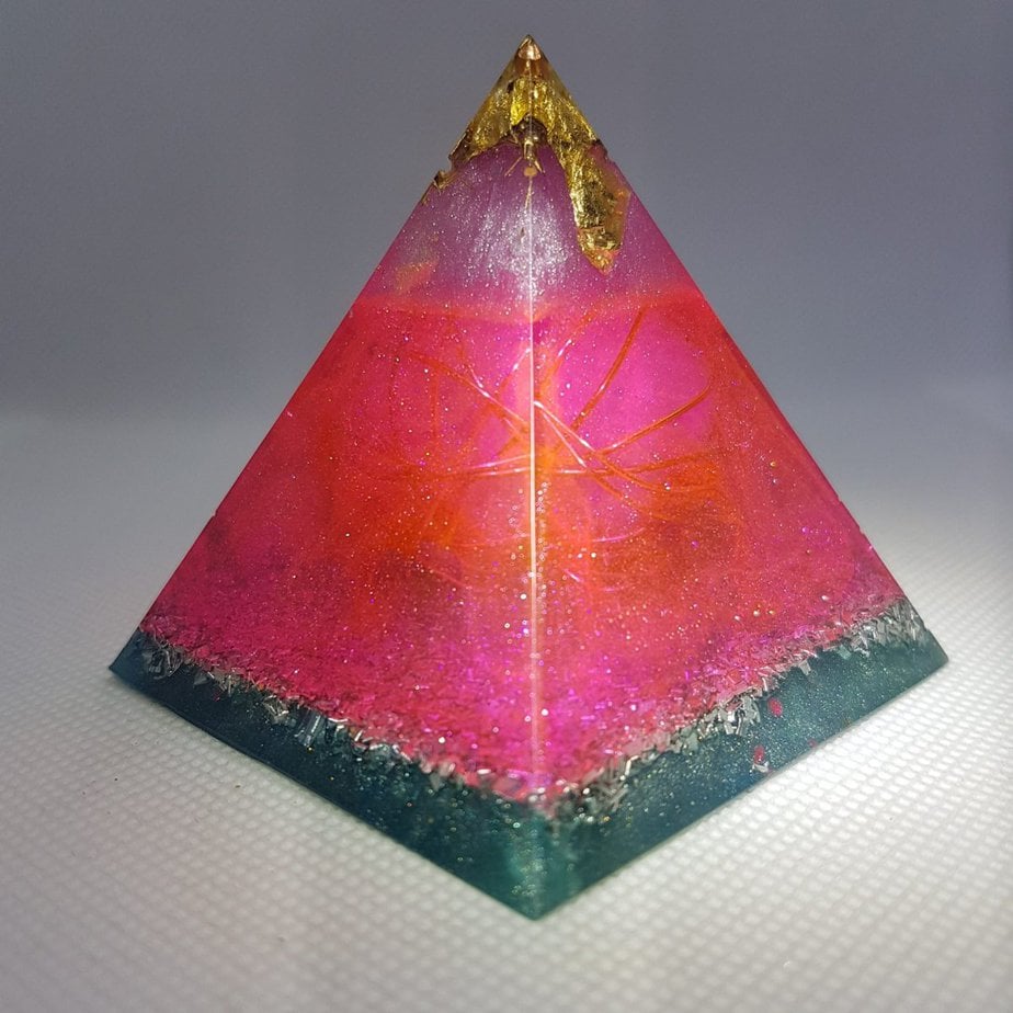 Freed of Shackles Orgone Orgonite Pyramid 6cm - Tranquil and Loving Rose Quartz all wrapped up in Copper Ball with Herkimer Diamonds, Celestite and a touch of gold for emf protection