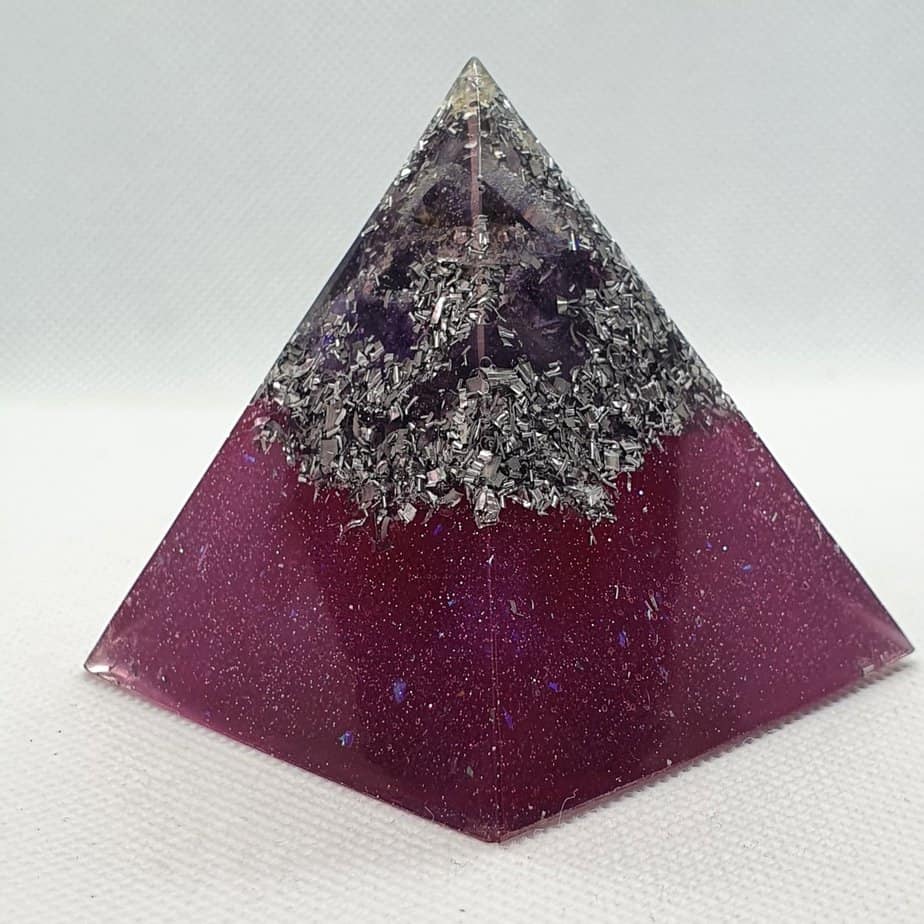 Obscured by Amethyst Orgone Orgonite Pyramid 6cm - A number of Amethyst Points with a Herkimer Diamond, layer of silver and aluminium, Herkimer Diamonds and a Quartz Chunk to bring focus