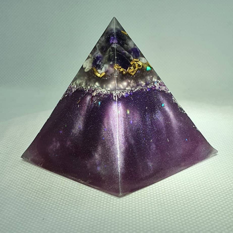 When the World Turns Amethyst Orgonite Pyramid 6cm - Amethyst, Brass, Silver and Aluminium over a Quartz Point and Tourmaline