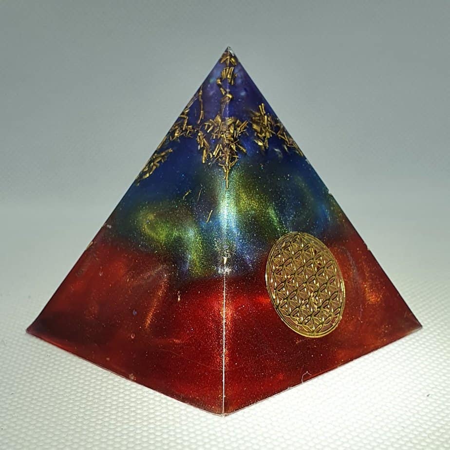 Full Double Rainbow Orgone Orgonite Pyramid 6cm - Herkimer Diamonds, Cleat Quartz Point, Celstite, Sacred Geometry, Rose Quartz and Gold deep within this Multicoloured, Multifaceted Rainbow Orgonite