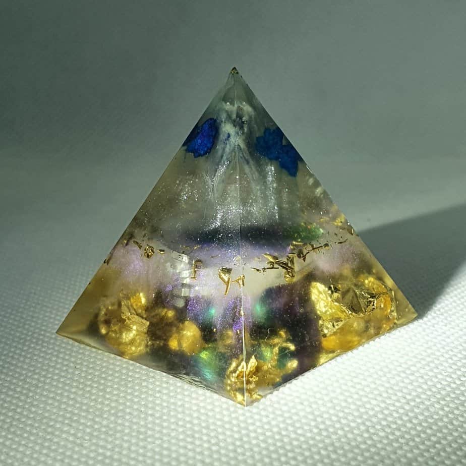 Blue Space Orgone Orgonite Pyramid 4cm - A heart of Titanium Aura Quartz, with blue Quartz, Kyanite, Herkimer Diamonds and gold for Piezoelectric effect. 4.5cm base