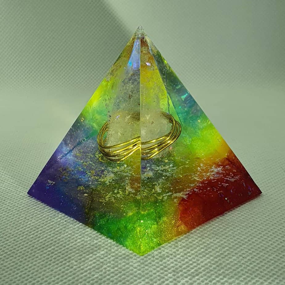 Spectrum of Light - Words cannot express the Beauty and Light that emanates from this Orgonite, A Large Quartz point simply wrapped in Brass, completed by the Rainbow with White Titanium Power as part of the greater concept - Light of the Spectrum!