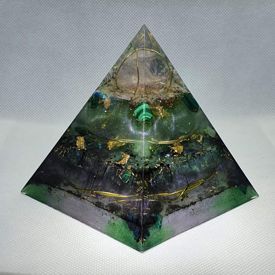 Floating Mind Orgone Orgonite Pyramid 9cm- Float away with this Rose Quartz Sphere Orgonite is like looking into the depth of time...with a heart beating of Malachite, Chrysoprase, Green Adventurine, Brass and Shungite and 24 Carat Gold